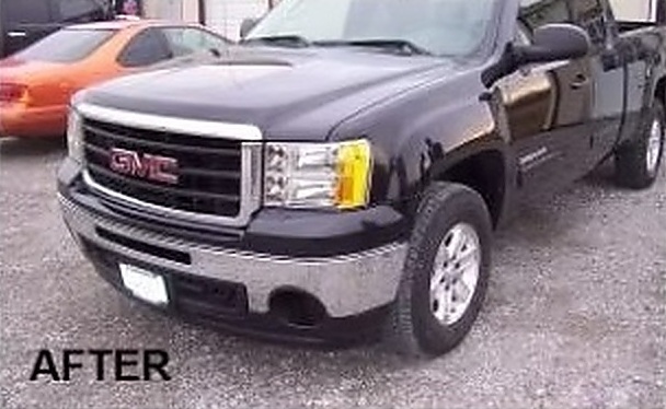 After: a black GMC Sierra 1500 repaired by Fenton's Custom & Collision