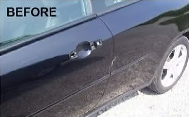 Before: a door and rocker panel dent on a black Pontiac G6 coupe