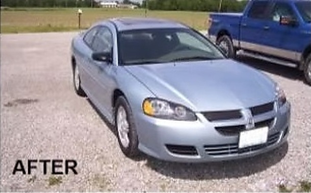 After: a light blue Dodge Stratus coupe repaired by Fenton's Custom & Collision